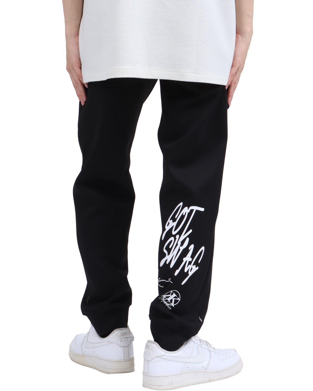 Karl Kani] ダンボールニット グラフィティロゴ スウェットパンツ