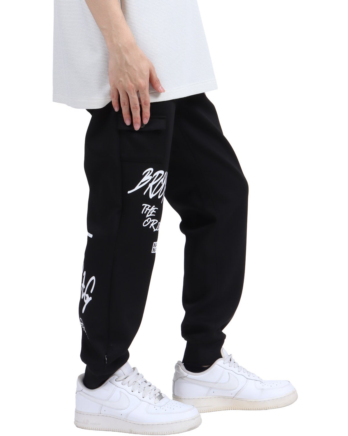 Karl Kani] ダンボールニット グラフィティロゴ スウェットパンツ