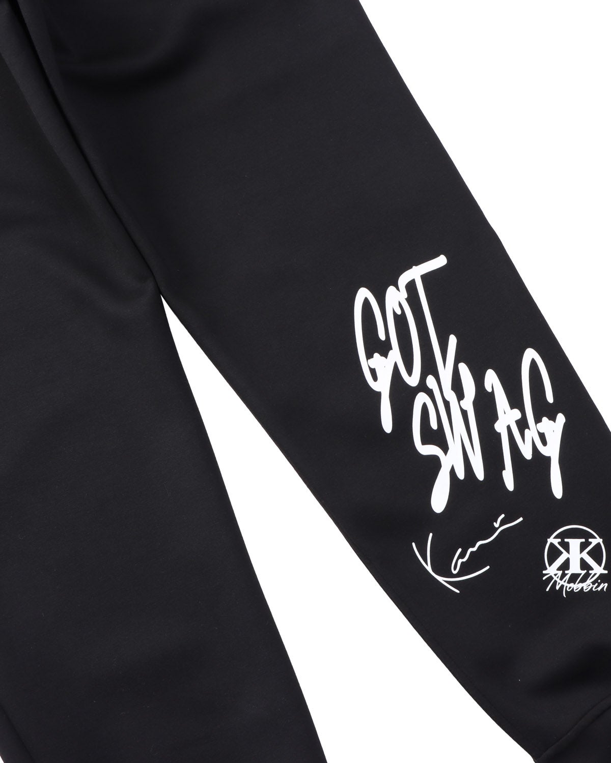 Karl Kani] ダンボールニット グラフィティロゴ スウェットパンツ