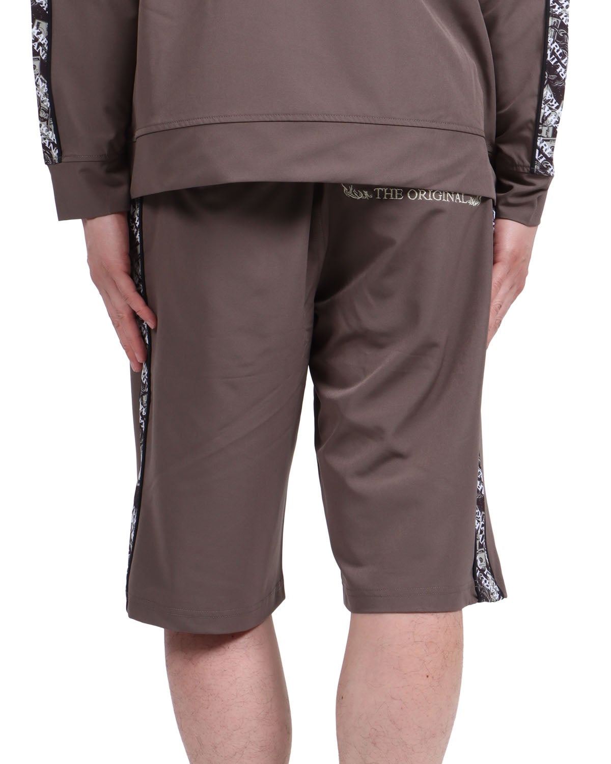 ブラウン：174cm62kg(Lサイズ着用)