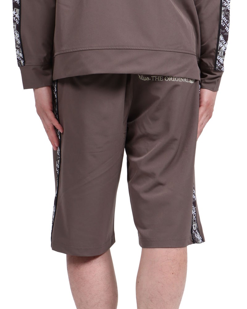 ブラウン：174cm62kg(Lサイズ着用)