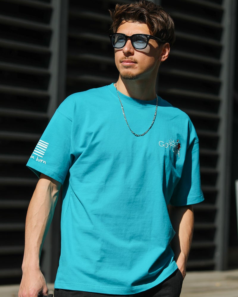 エメラルドグリーン：180cm/70kg(Lサイズ着用)